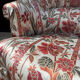 Fauteuil crapaud satin fleuri ancien