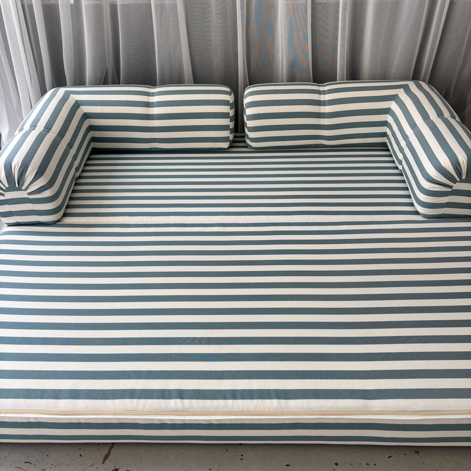 Vintage green and white striped sofa bed