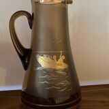Vintage smoked glass carafe with gold from the 50s/60s, featuring a marine and water skiing design.