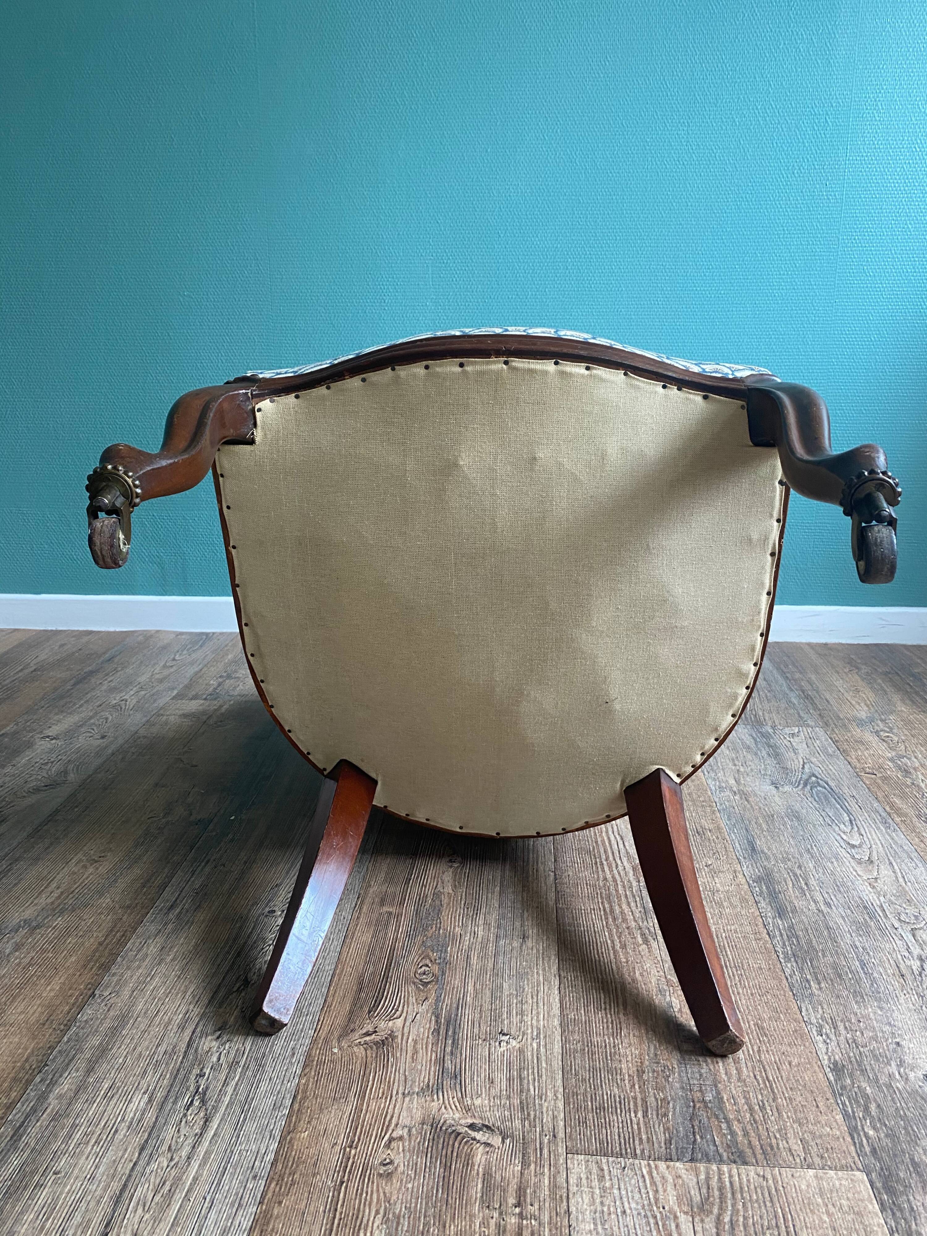 Blue shepherd's chair in mahogany era 19th