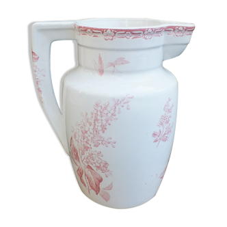 Old pitcher or broc of toilet in Iron Earth pink decoration Flowers and Insects