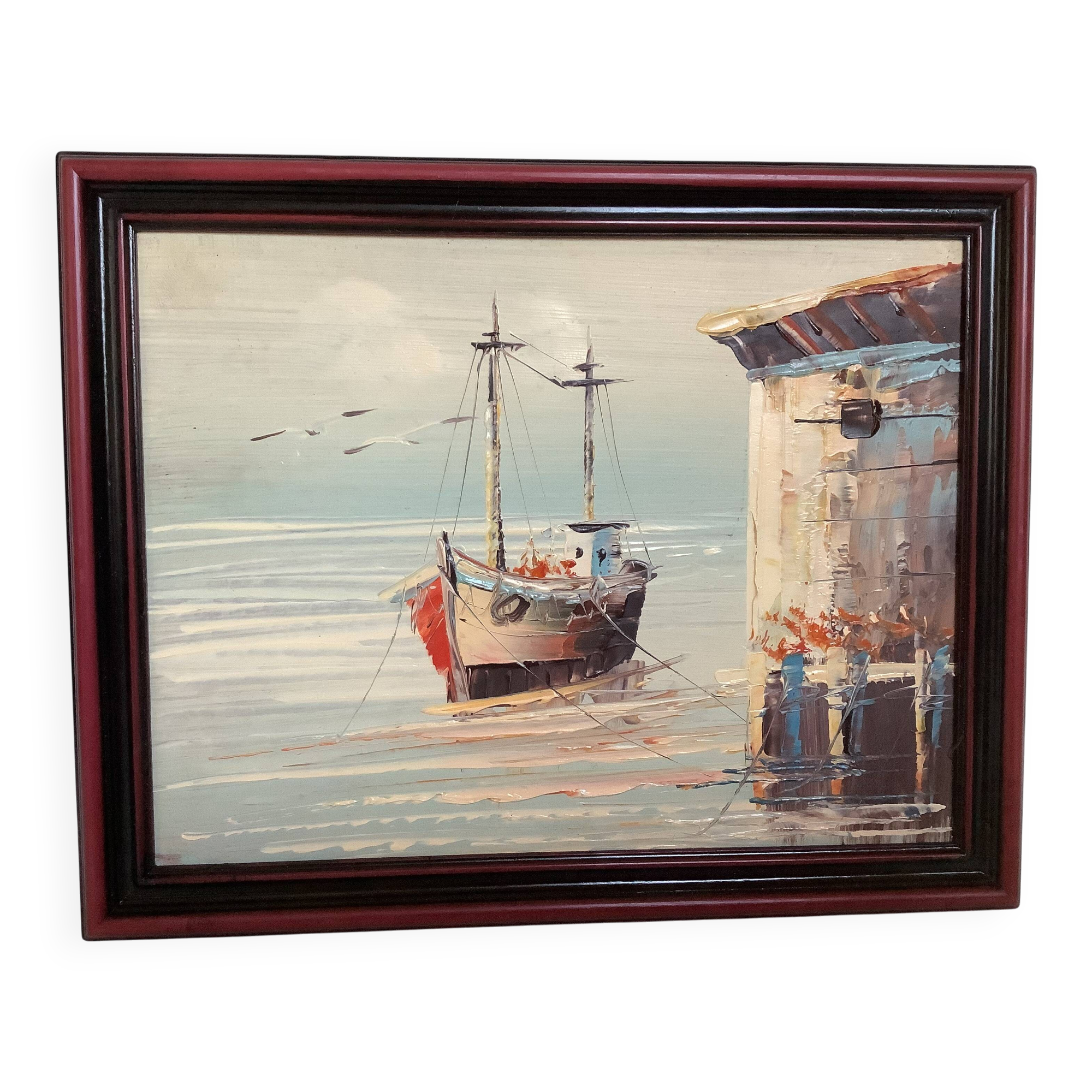 Small marine painting of a boat in oil on panel.