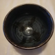 Enamelled ceramic cup