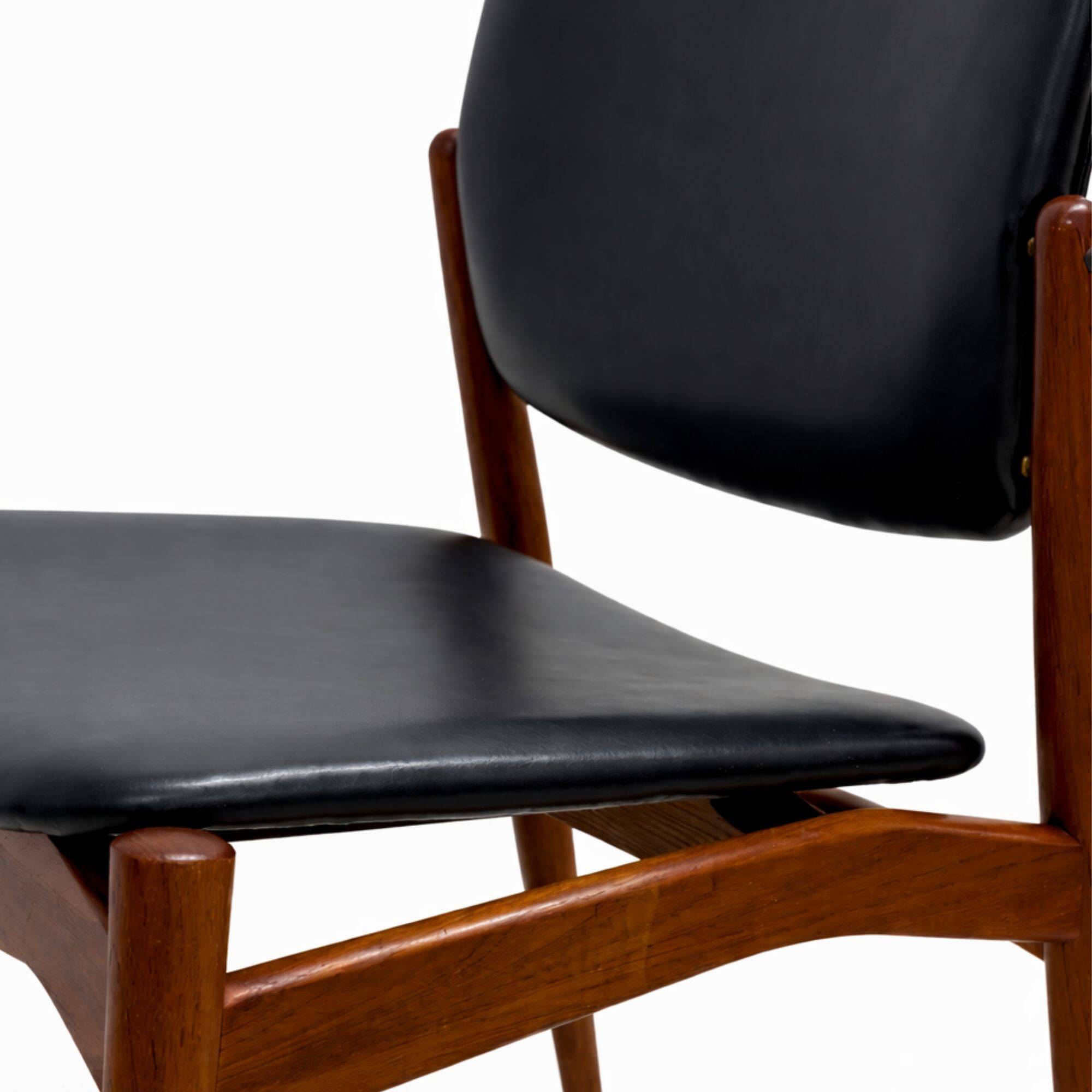 Captain chair pair by Erik Buch
