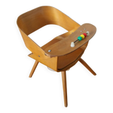 Baumann Baby Coquille children's armchair in bent wood with splayed legs.