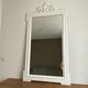 Miroir fin 19ème avec fronton décoré. 160x90.