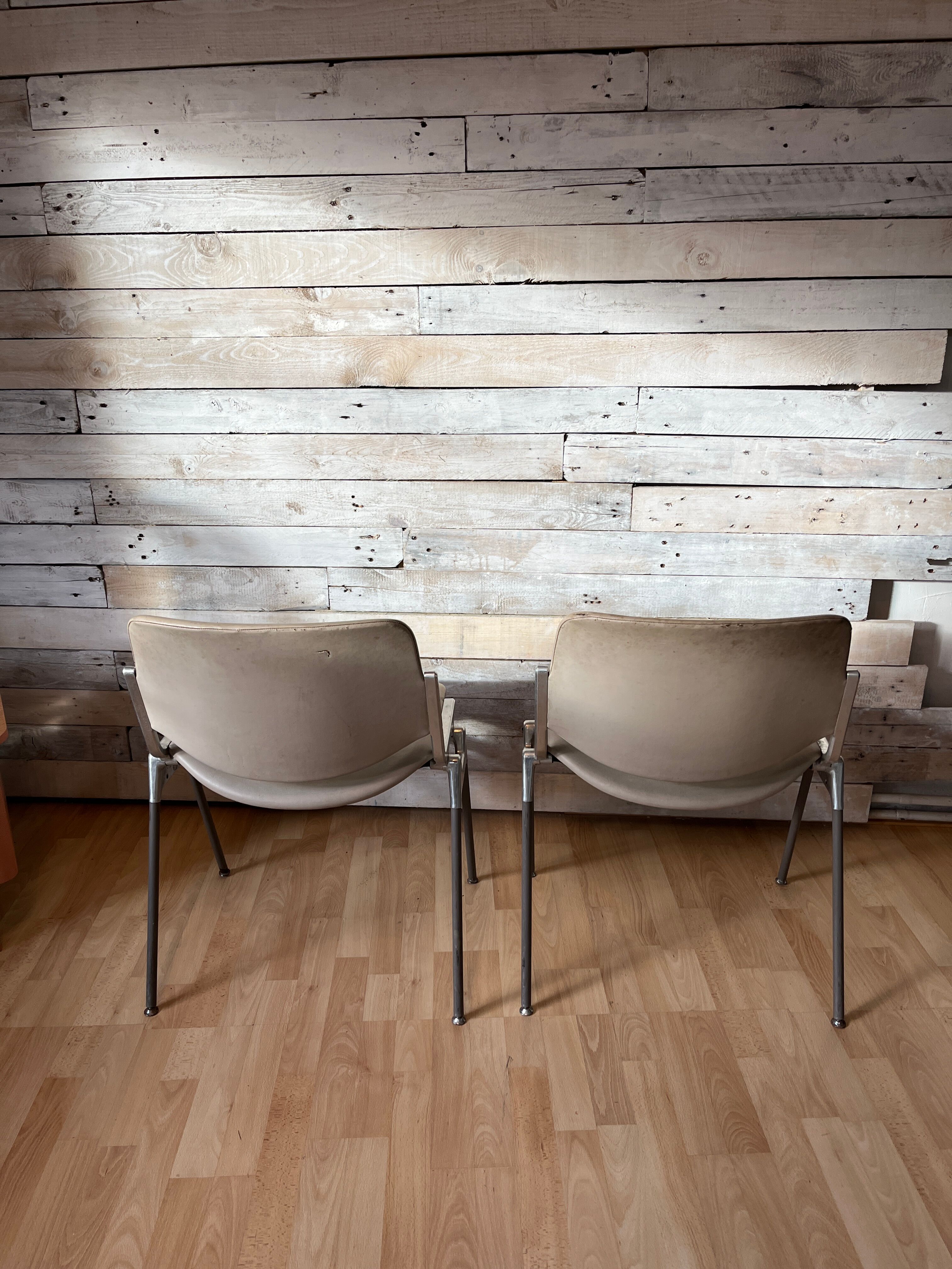 Pair of stackable chairs by Giancarlo Piretti for Castelli