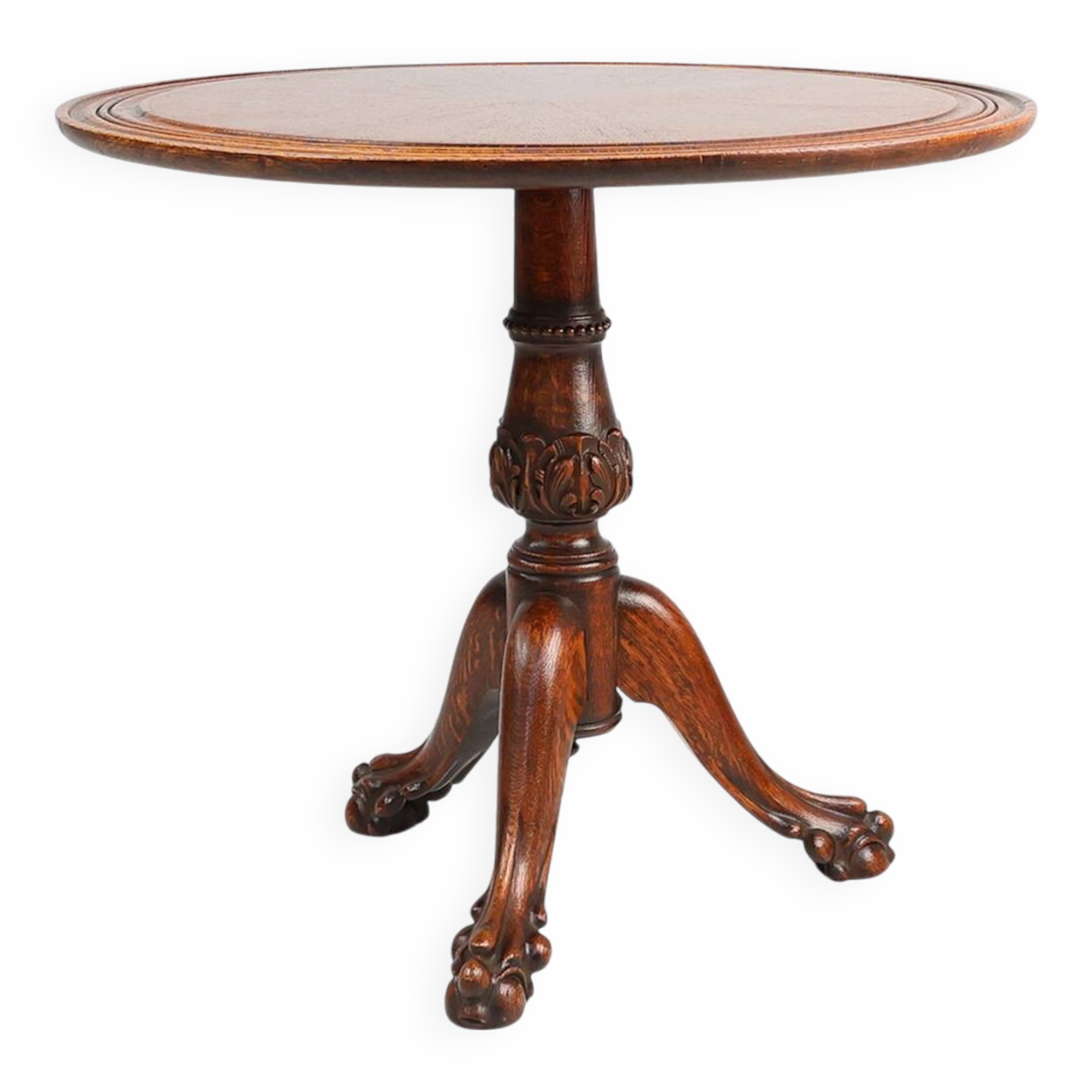 Antique English hand carved circular oak side table with lions head feet