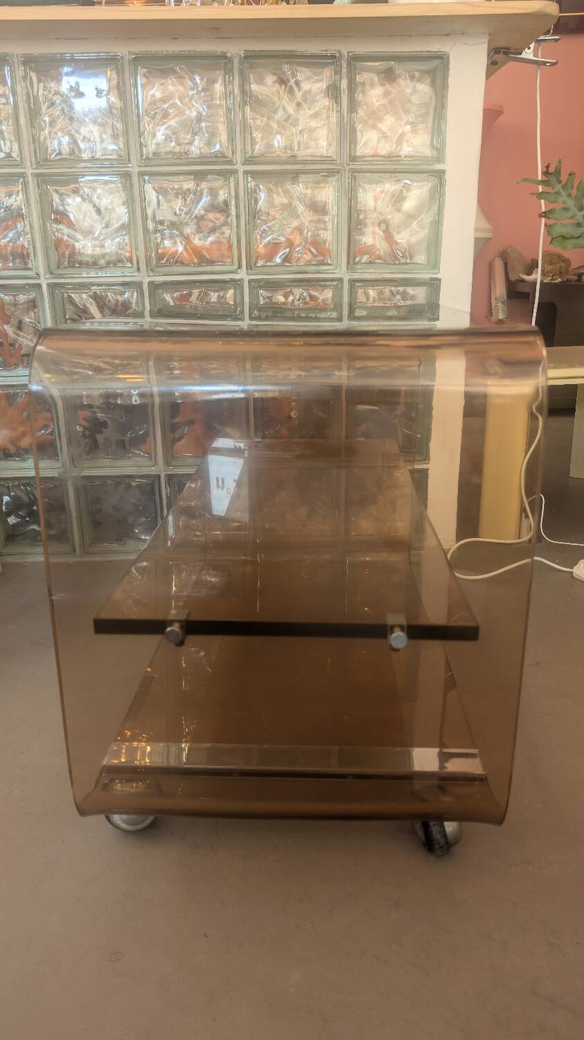 Smoked plexiglass coffee table