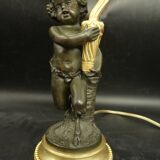 Clodion faun lamp, Louis XVI style, early 1900s - gilded and patinated bronze