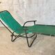 Green fabric and black metal tube long chair
