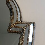 Mirror consisting of multi-faceted mirrors and brass garlands, French work, around 1970