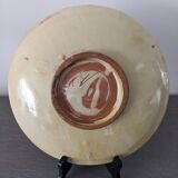 Vintage ceramic plate with enamel decoration