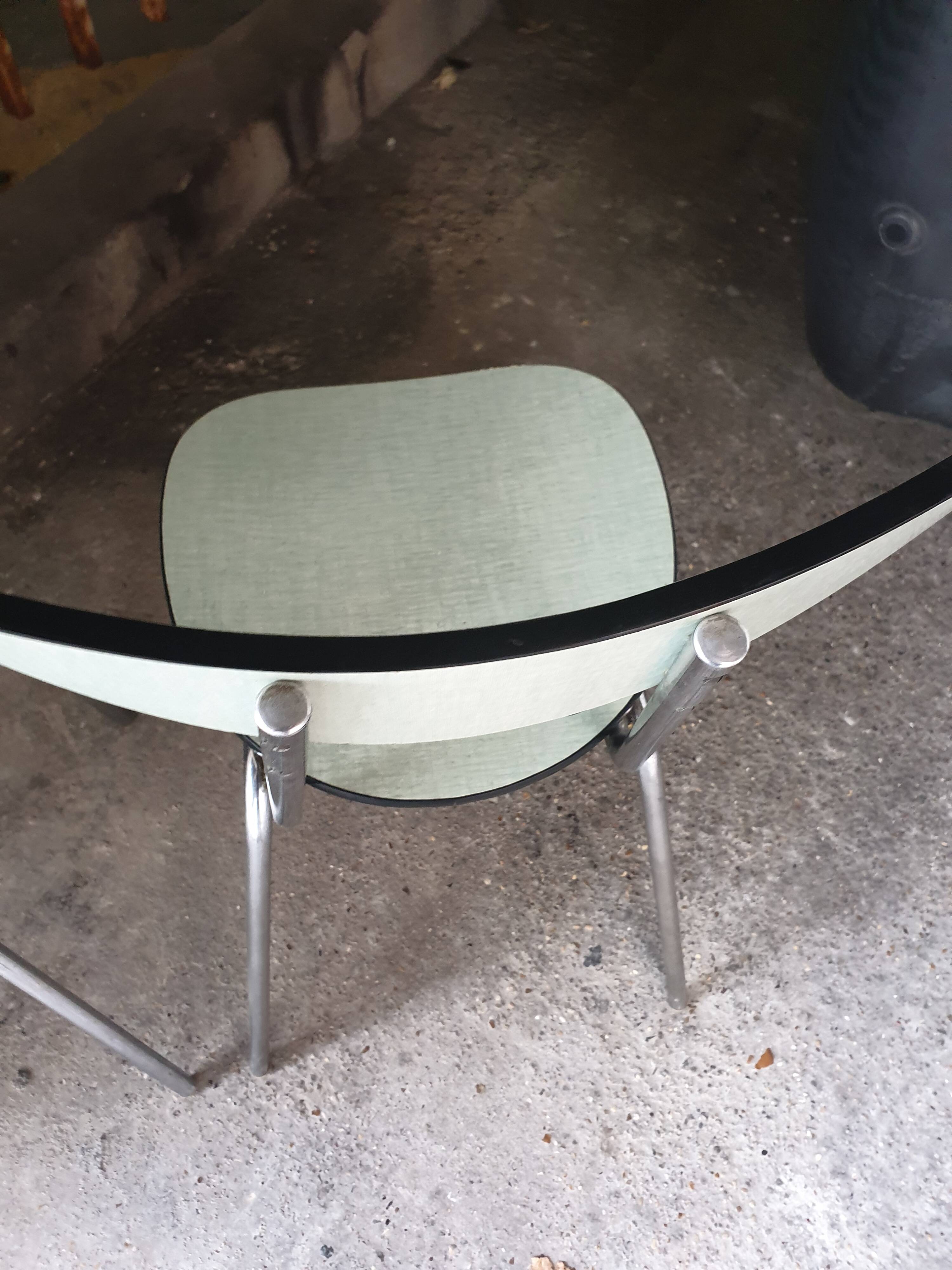 2 seventies water green formica chairs