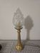Table lamp with brass base and vintage flame globe
