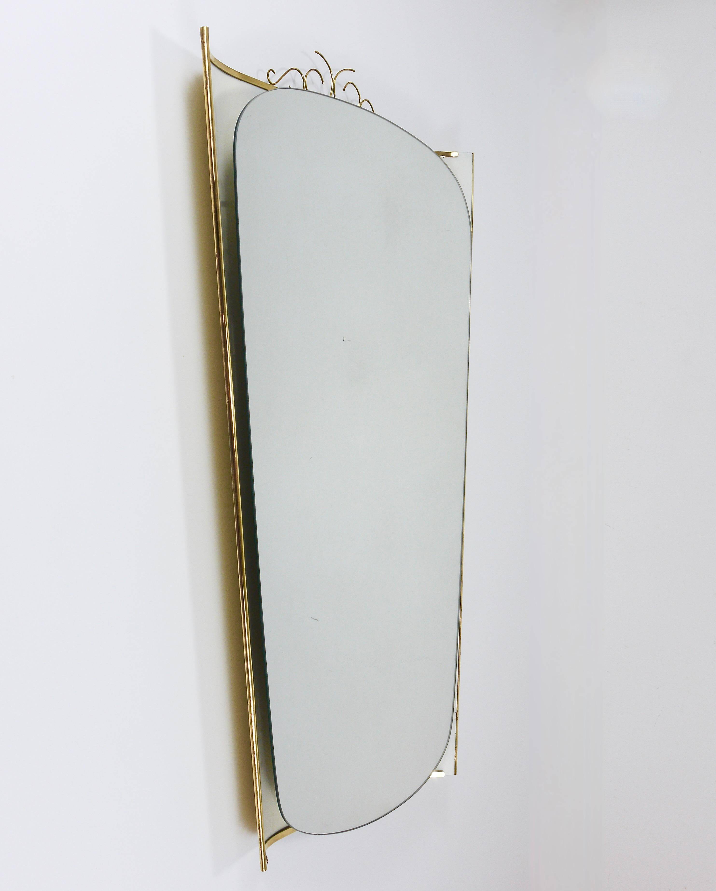 Mid-century illuminated wall mirror by Ernest Igl with brass crown, by Hillebrand.