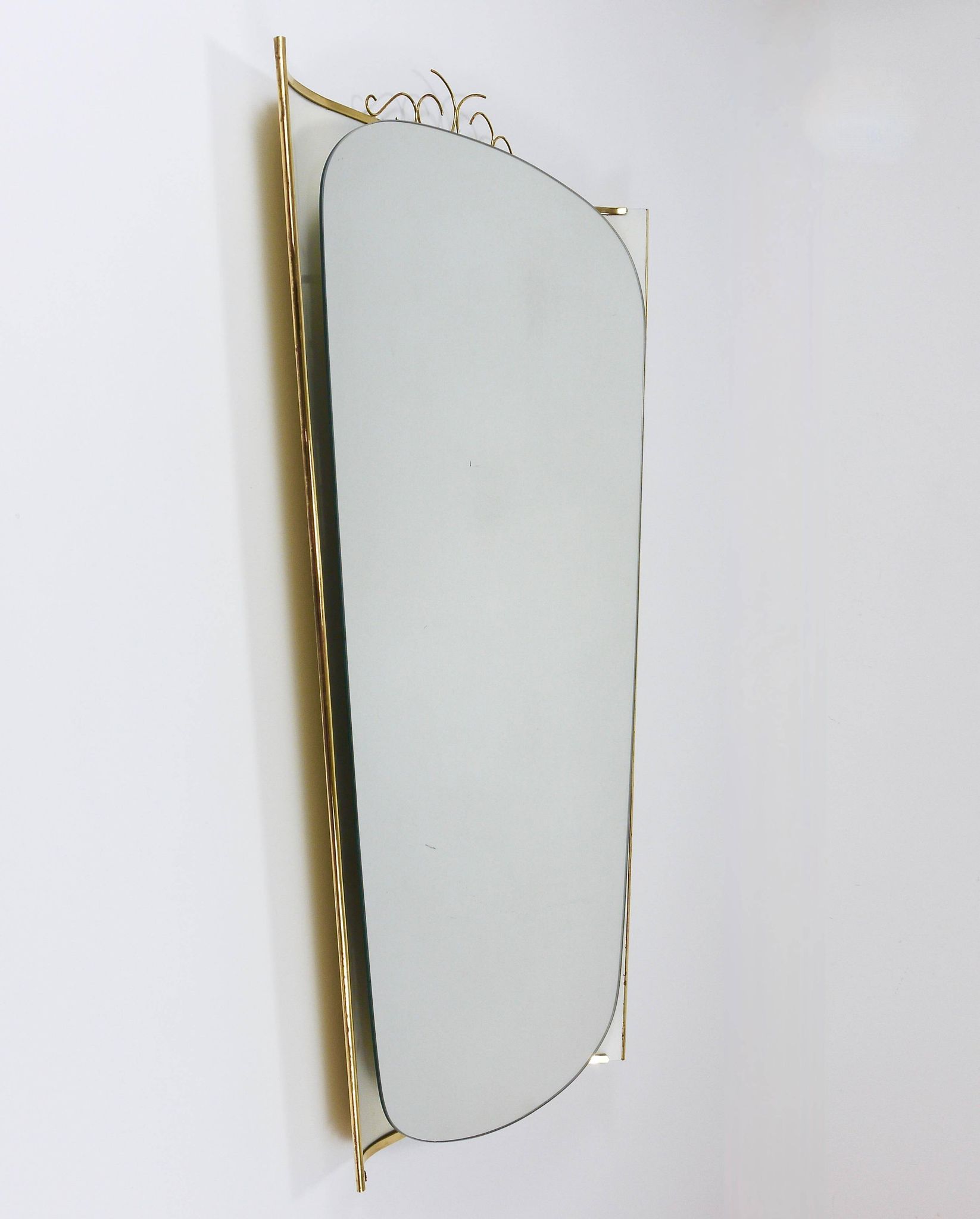 Mid-century illuminated wall mirror by Ernest Igl with brass crown, by Hillebrand.