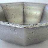 Empty octagonal pocket in tin by the workshop "Les Etains de France"
