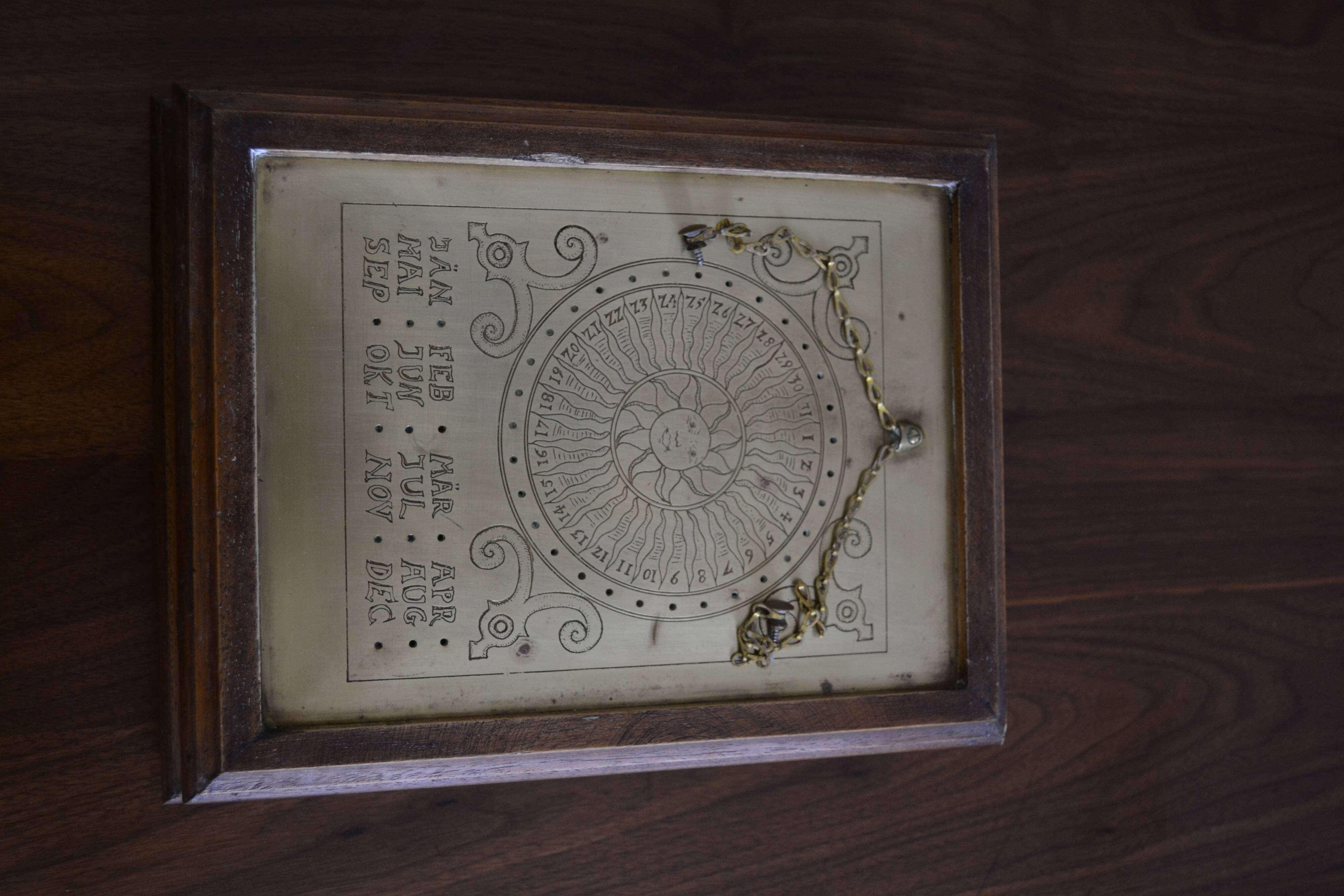 Drink with wooden keys solar perpetual calendar