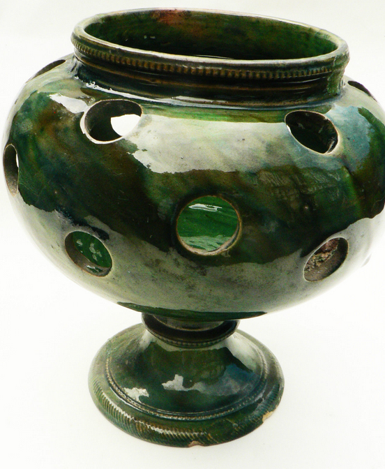 details on old bulb pot in glazed earthenware