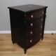 Chest of drawers 4 drawers in walnut and blackened wood.