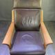 Chocolate leather armchair, wooden structure