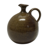 Jar in sandstone with a handle