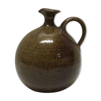 Jar in sandstone with a handle