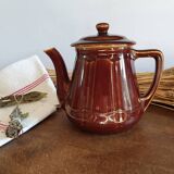 Vintage tea maker in old-fashioned country house-style earthenware