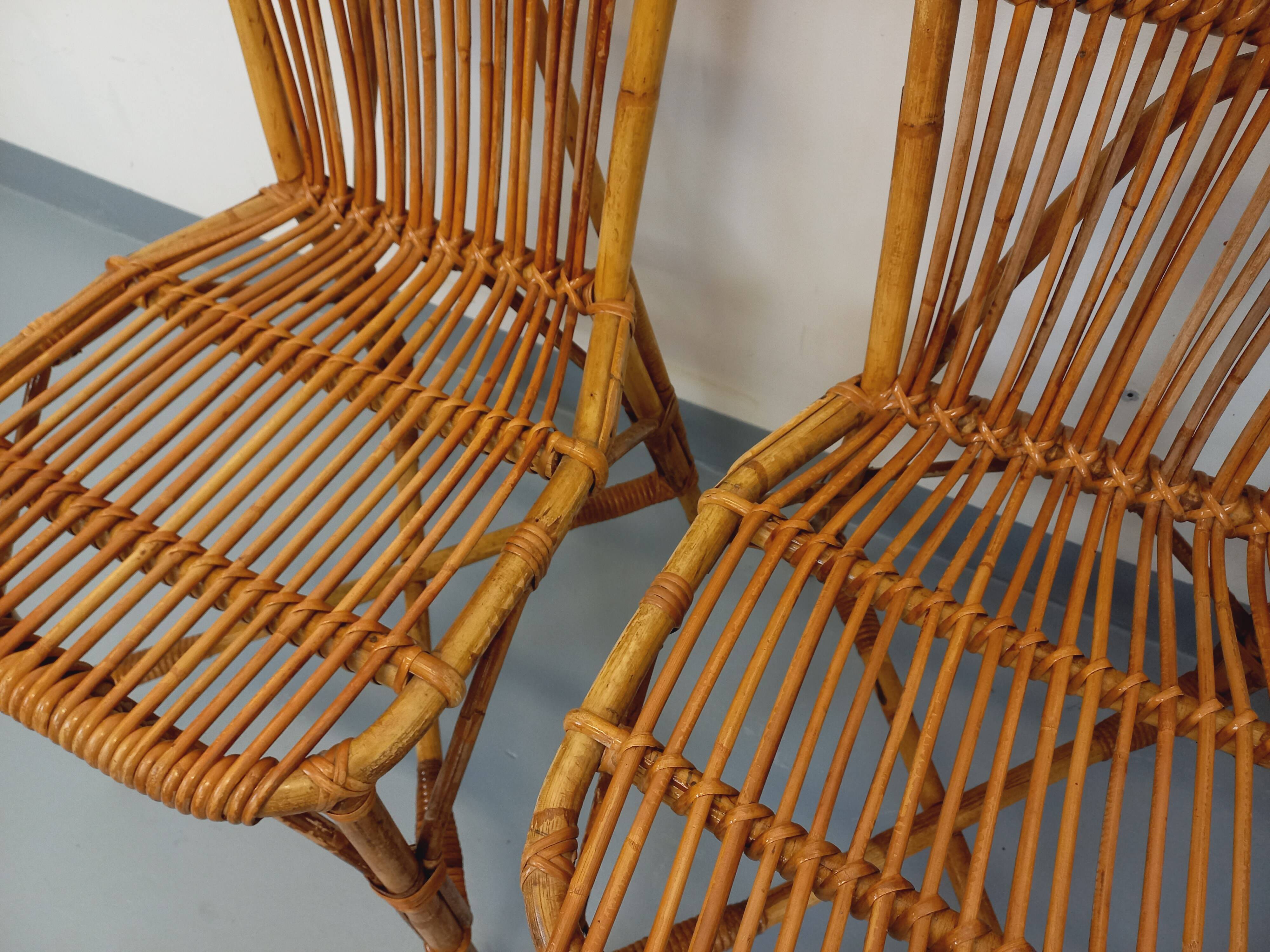 Set of 4 vintage Audoux Minet rattan chairs from the 1950s and 60s.