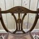 Fauteuil curule , assise cannée