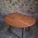 Rustic French antique dining table, drop-leaf table in cherry wood, circa 1900.