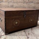 Teak chest from Burma with carved rosettes.