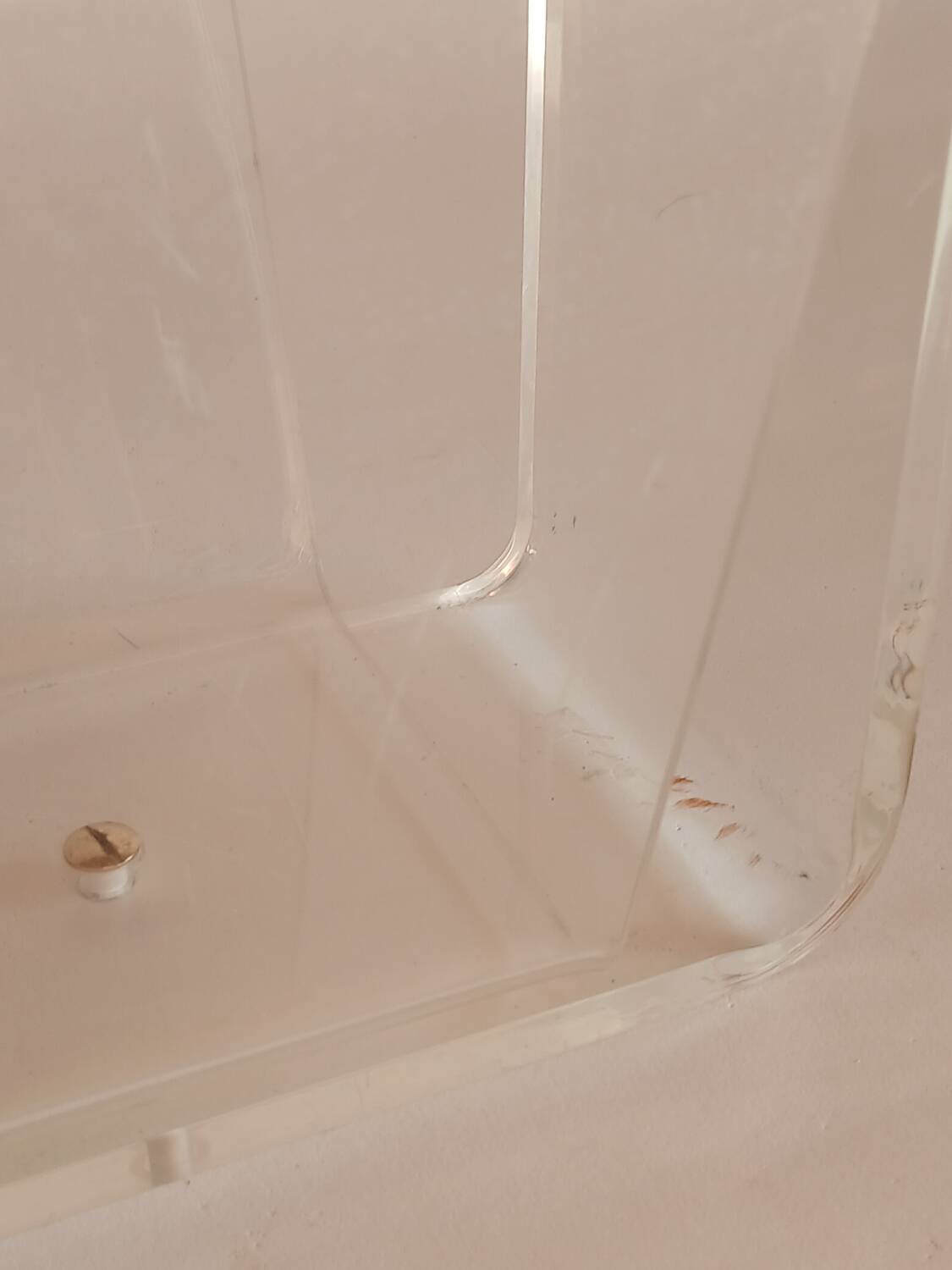 Acrylic magazine rack by David Lange