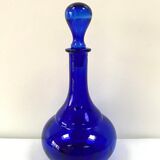 Antique decanter made of cobalt blue glass