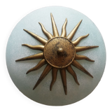 White opaque glass ceiling light and golden metal sun