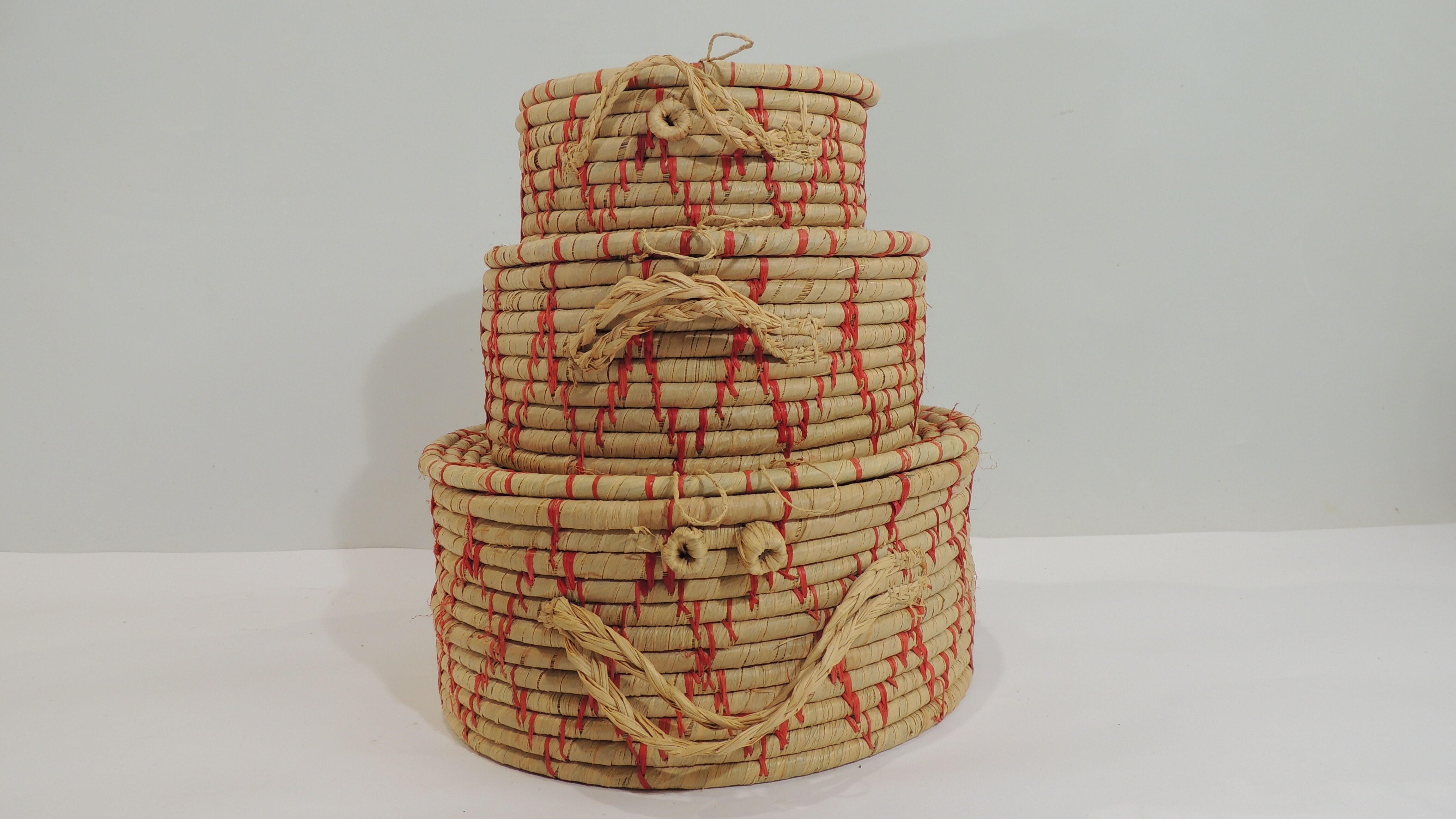 Set of three african raffia basket