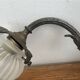 Antique bronze wall light in Louis XVI style - tulip-shaped glass paste flower.
