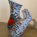 Granite ceramic pitcher and heart symbol