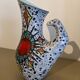 Granite ceramic pitcher and heart symbol