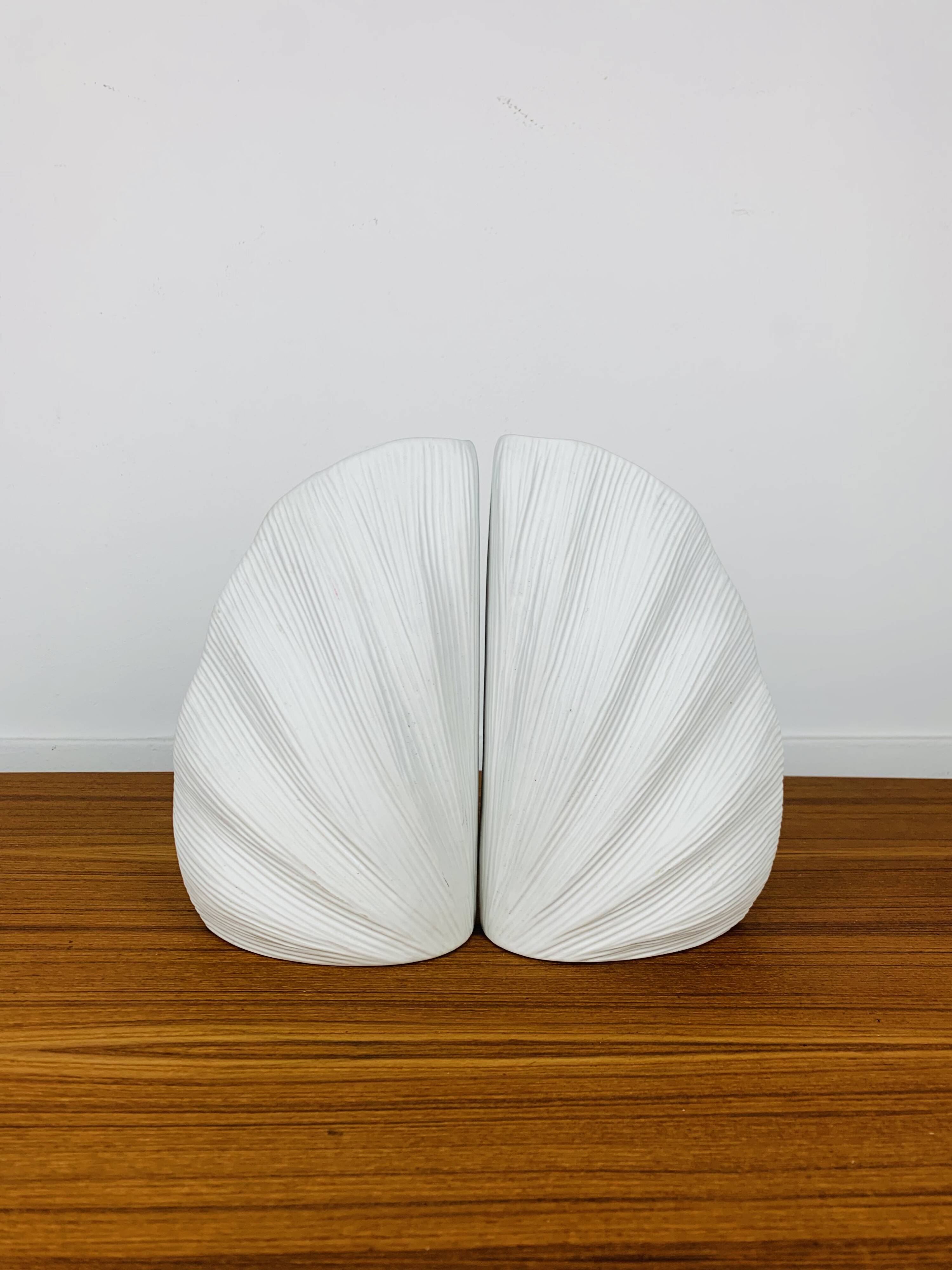 Pair of white ceramic coral vases, bookends