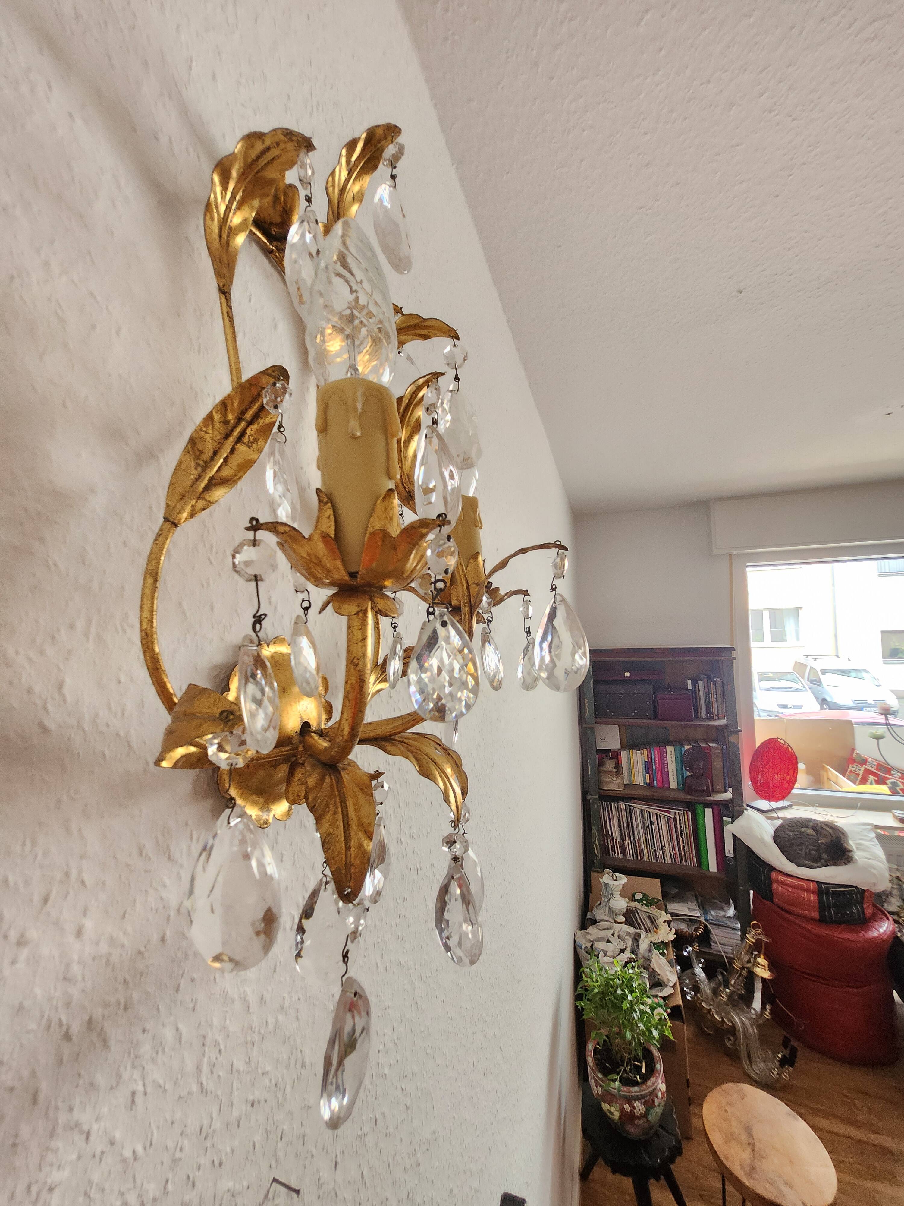 Hand-forged wall lamp gilded with gold leaf and crystals, Italy