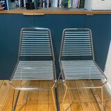 2 metal chairs with bungee cords