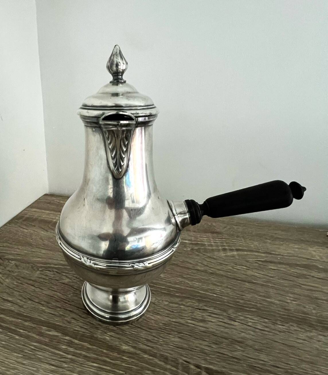 Silver-plated metal chocolate pot stamped ARGIT SFOA with an ebony handle.