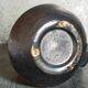 1950s iridescent black ceramic hand candle holder