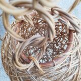 Suspension ball in line of rattan