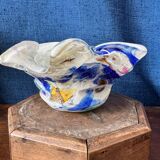 Multi-layer glass ashtray with metallic oxide inclusions.