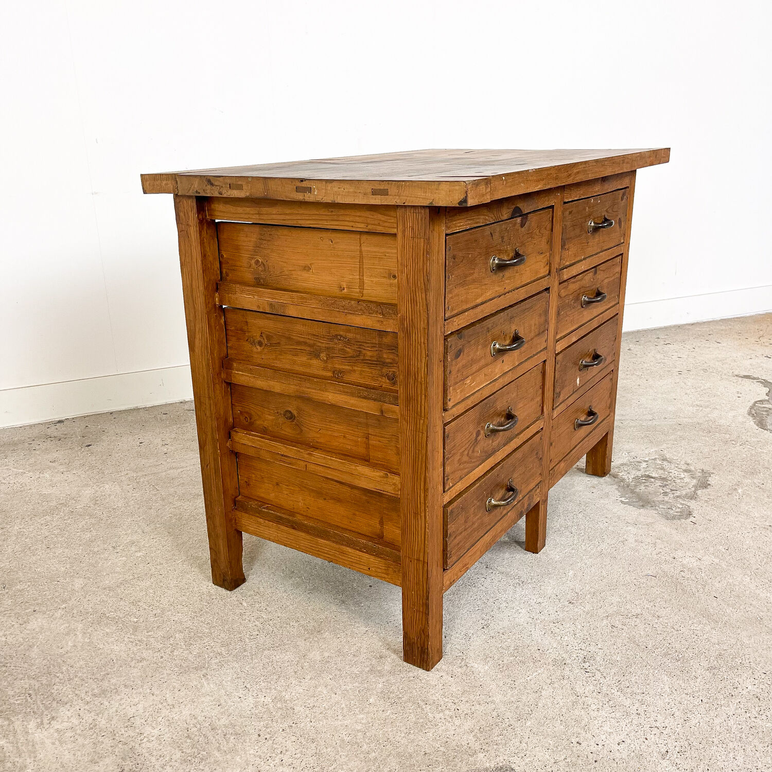 Vintage industrial wooden workbench with drawers