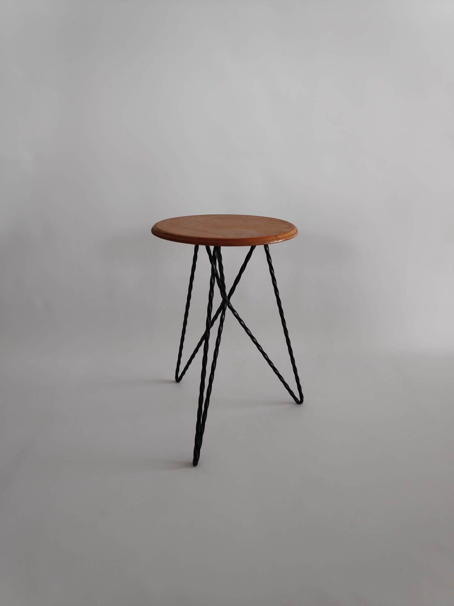 Vintage stool in wood and twisted metal of the years 60