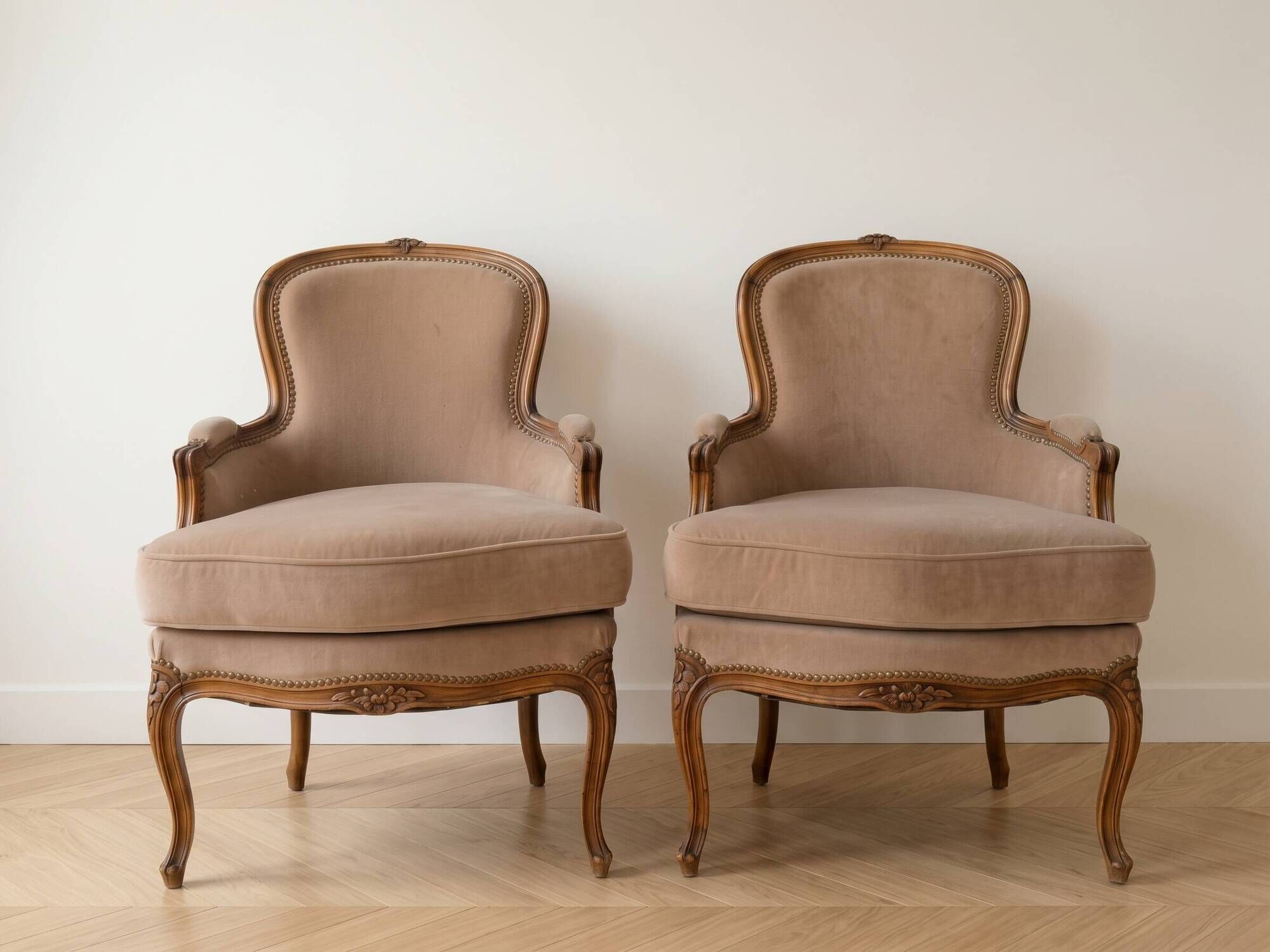 Pair of Louis XV armchairs in wood and beige fabric.